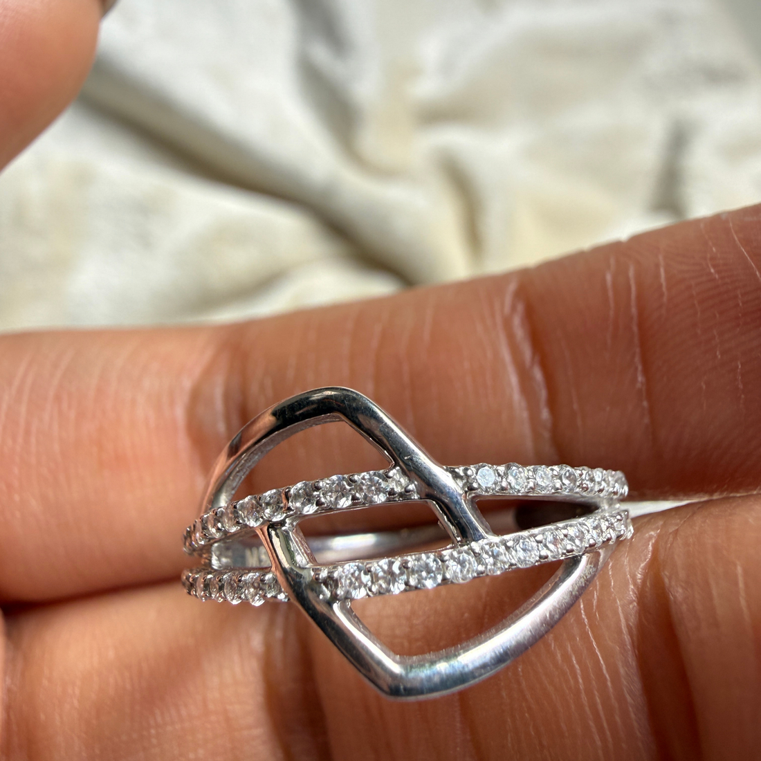 Contemporary open-frame diamond ring handcrafted in 9K, 14K and 18K gold.