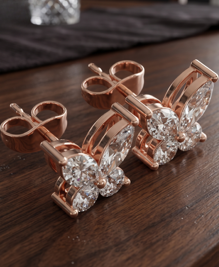 Marquise and round diamond butterfly earrings by Kiashaa Jewellery with brilliant sparkle.