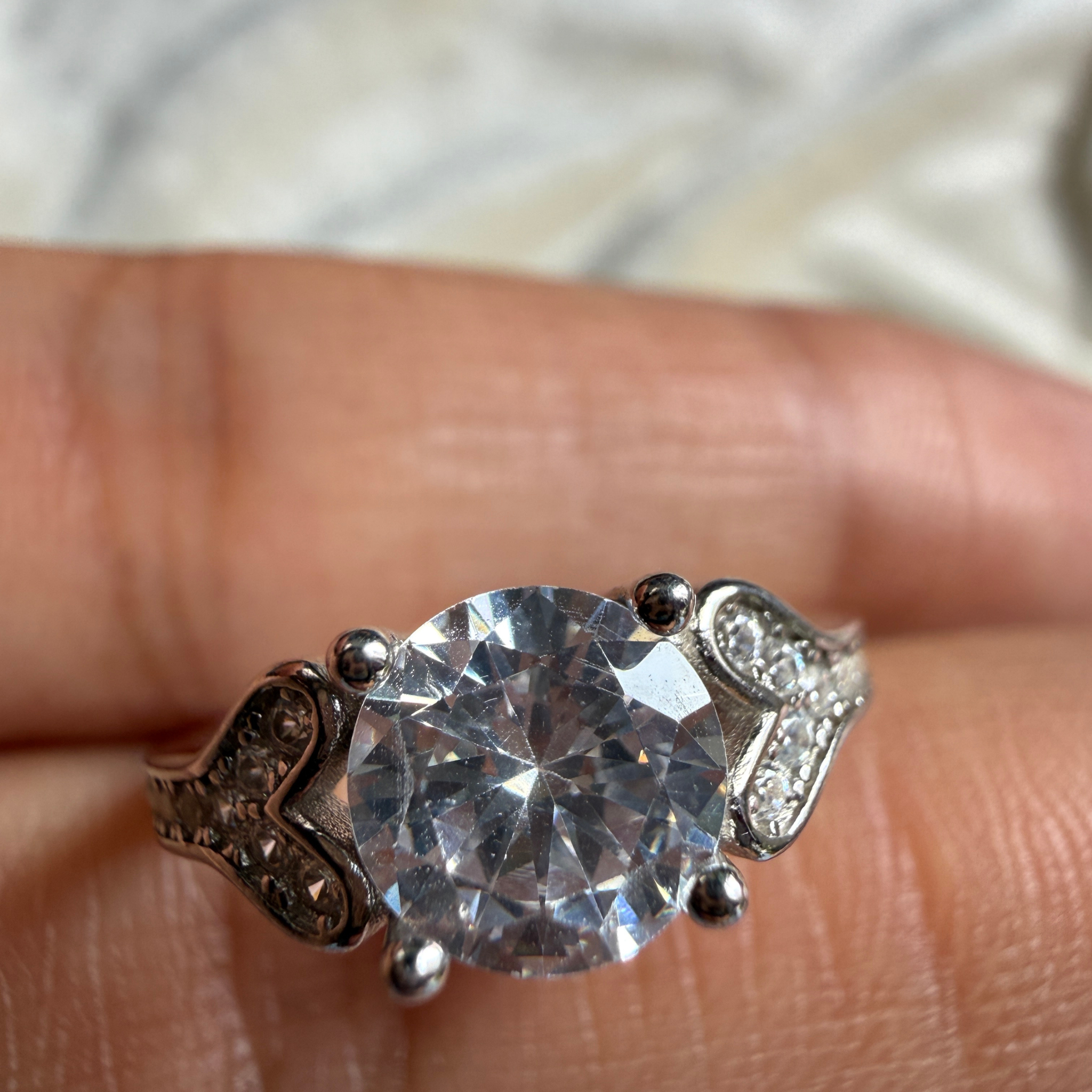 Round lab-grown diamond heart solitaire ring in white gold by Kiashaa Jewellery.