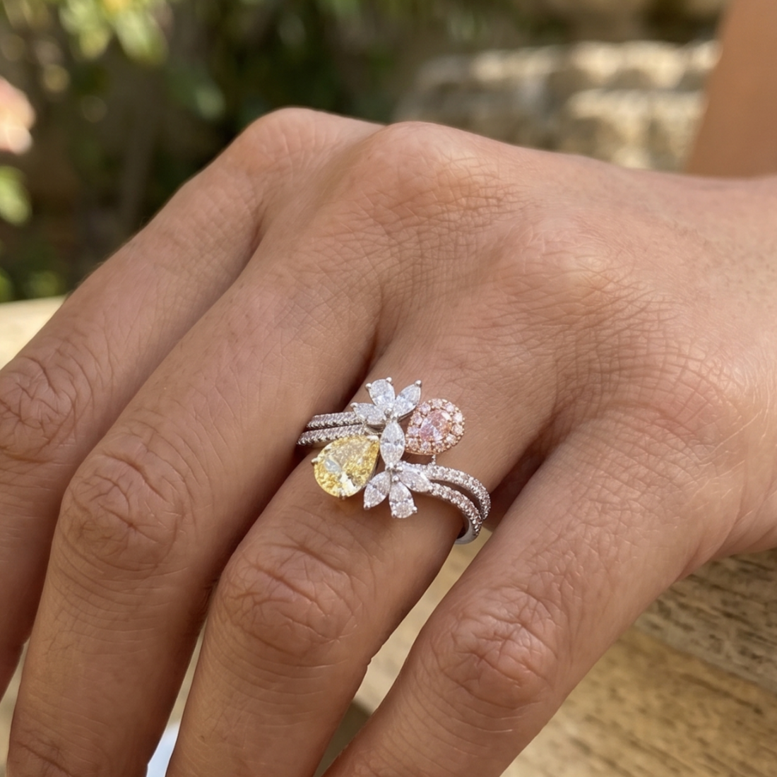 Aurora Bloom 3 CTW multi-color diamond floral ring by Kiashaa Jewellery with yellow and pink pear-shaped diamonds.