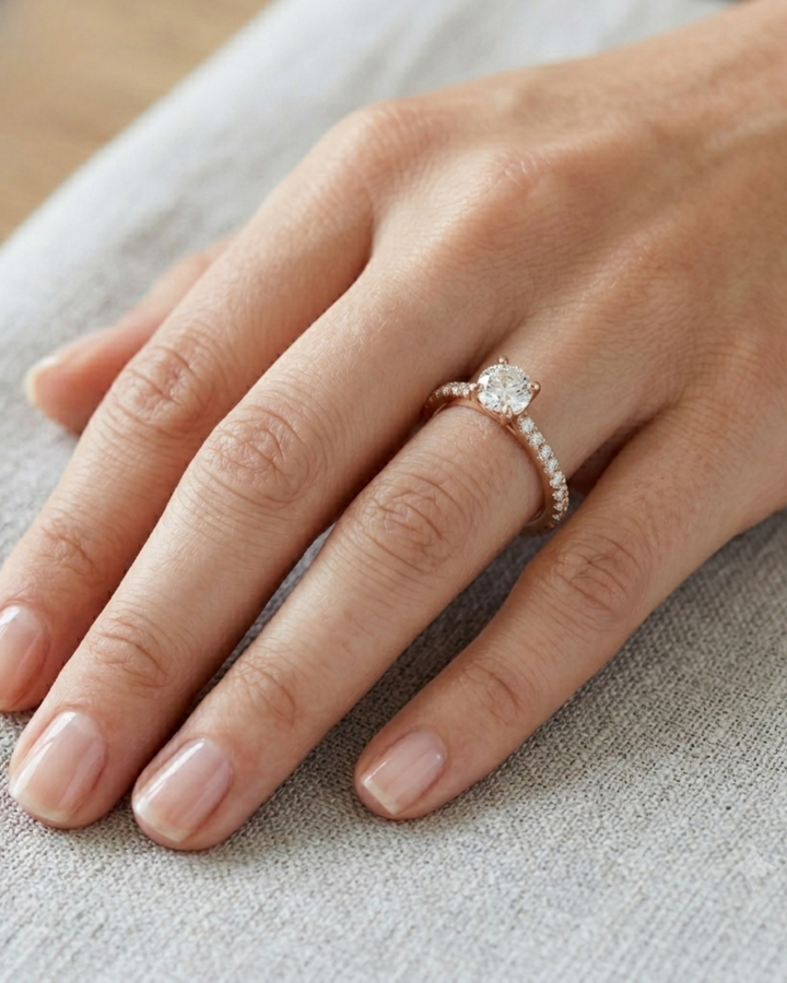 Premium round lab-grown diamond ring by Kiashaa Jewellery in rose gold with elegant pavé band detailing.