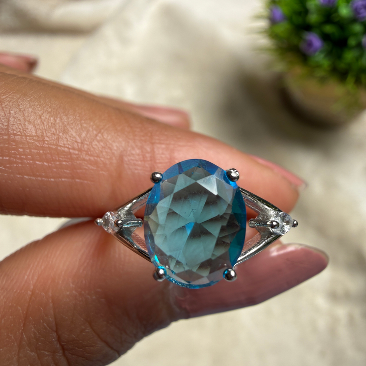 Blue oval gemstone solitaire ring with marquise lab-grown diamonds by Kiashaa Jewellery.