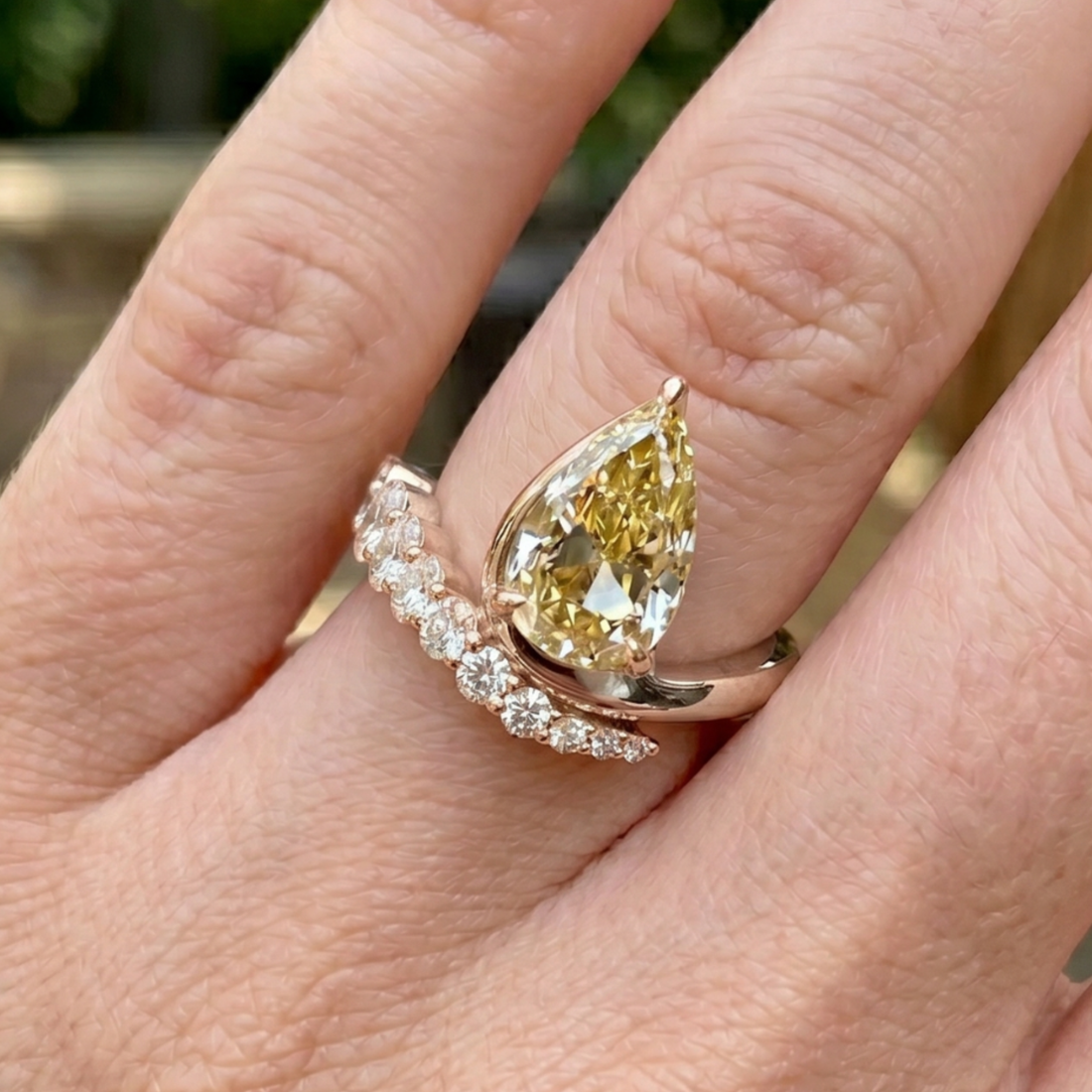 Aurelia 4.50 CTW pear diamond bypass ring by Kiashaa Jewellery featuring a 3 CT pear center diamond in polished yellow gold.