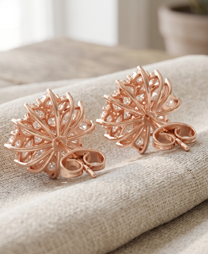 Close-up of prong-set marquise diamond petals surrounding brilliant round-cut diamond centres.