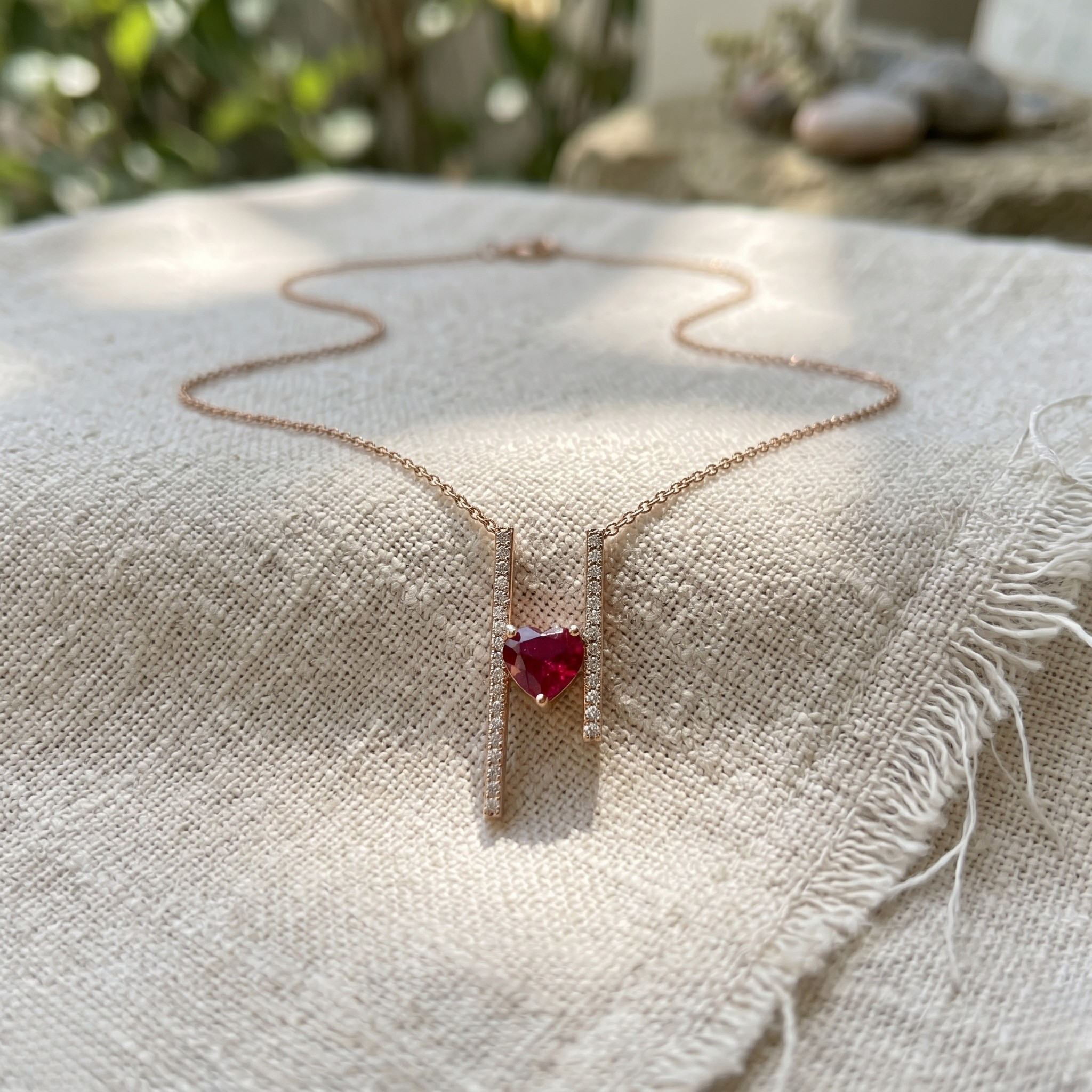 Red heart gemstone and lab-grown diamond pendant necklace by Kiashaa Jewellery in rose gold.