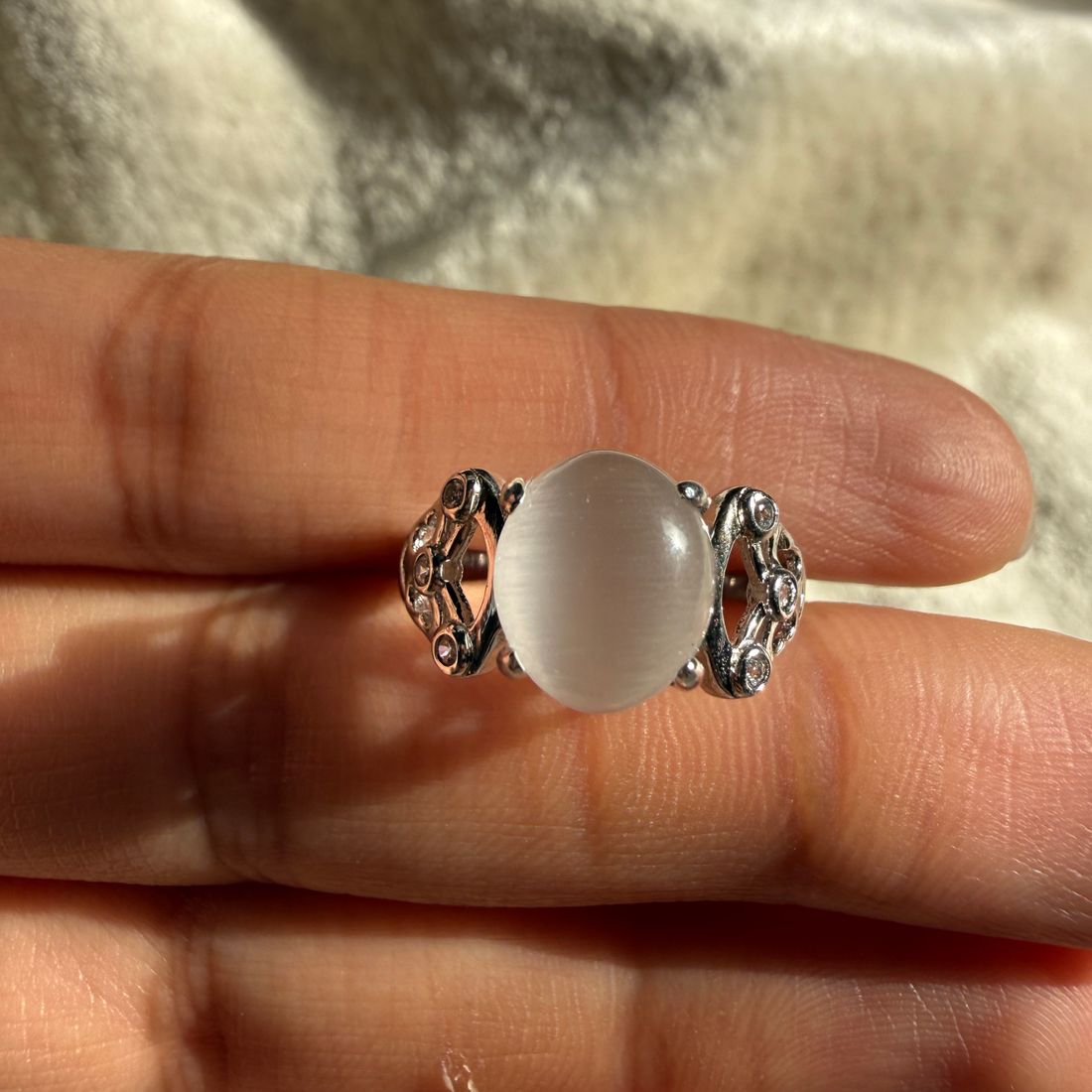 White cat's eye gemstone and lab-grown diamond ring by Kiashaa Jewellery.