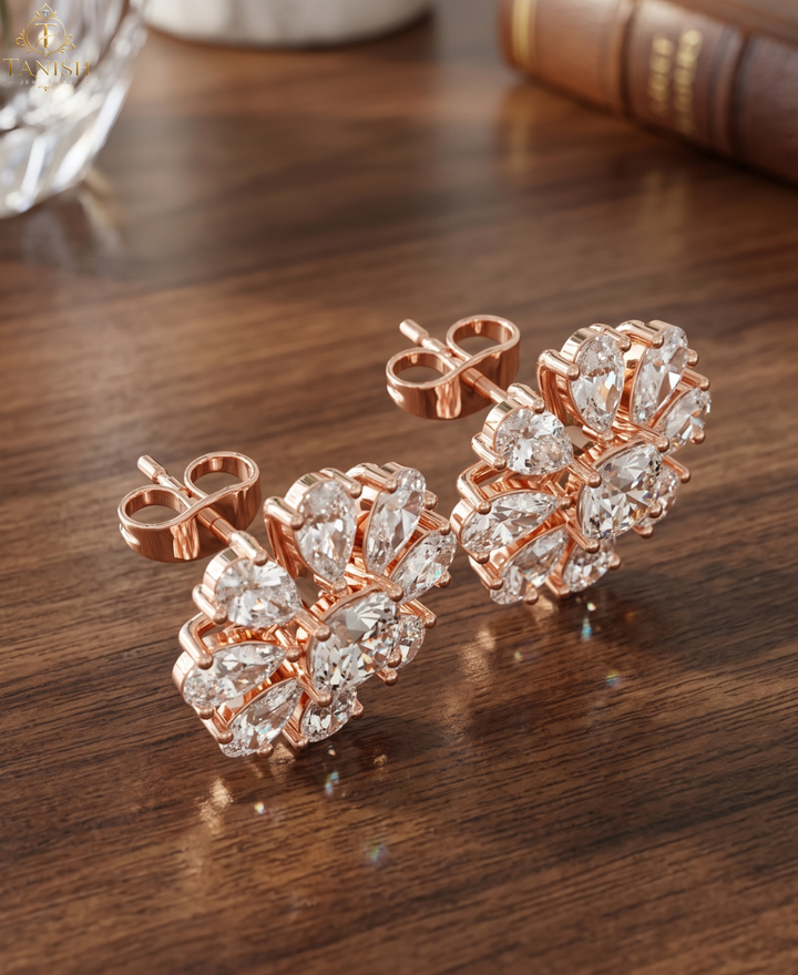 Side-angle view of lab-grown diamond floral earrings showing raised prong settings, straight posts, and push backs.