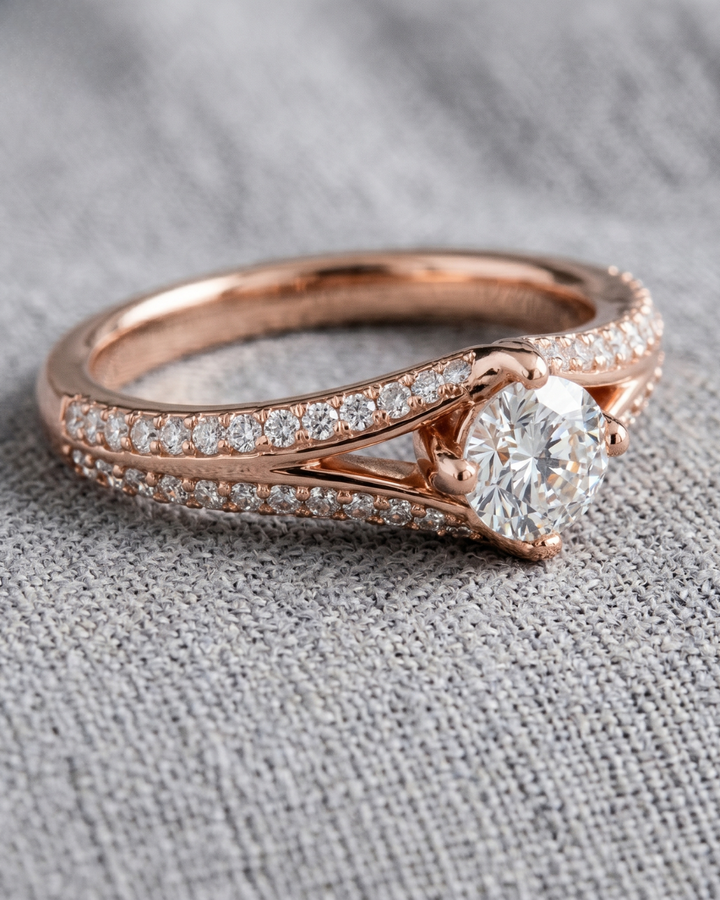 Rose gold round lab-grown diamond ring by Kiashaa Jewellery with a sculptural double-row crossover band.