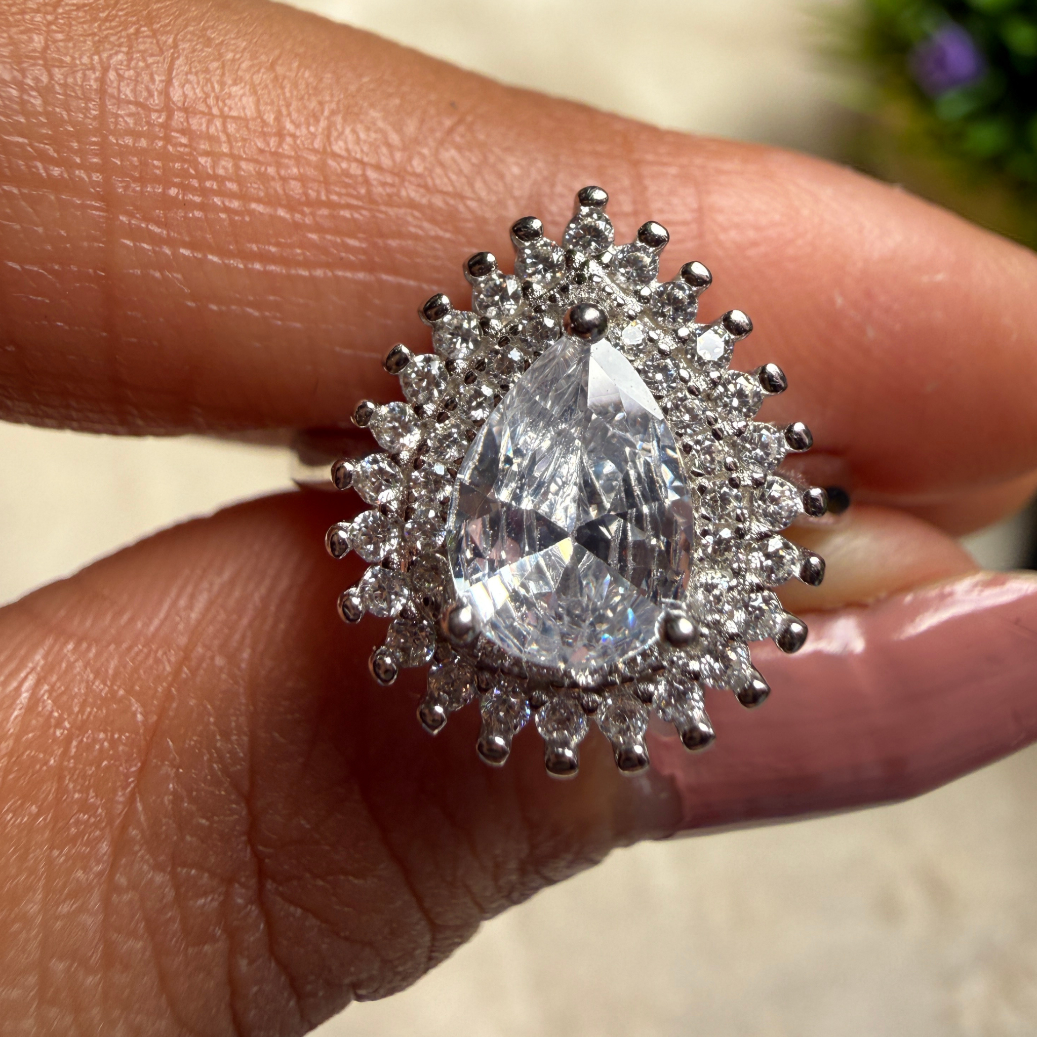 Pear halo lab-grown diamond engagement ring in white gold by Kiashaa Jewellery.