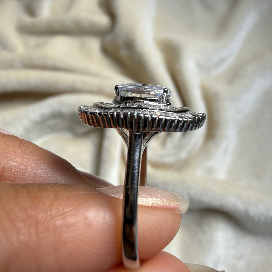 Oval and baguette lab-grown diamond double halo ring by Kiashaa Jewellery.