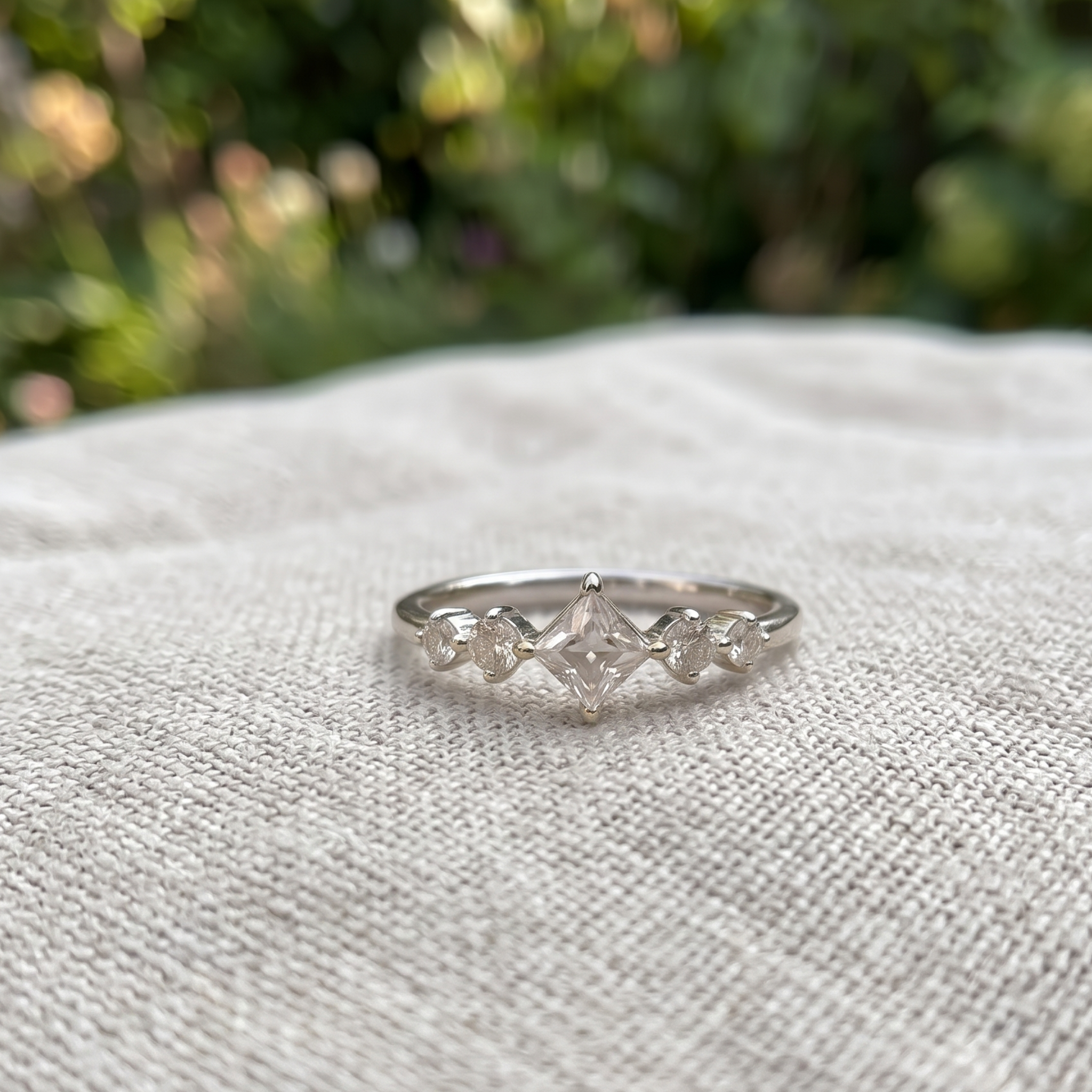 Kiashaa Jewellery 0.764 CTW princess and round diamond ring in polished rose gold.