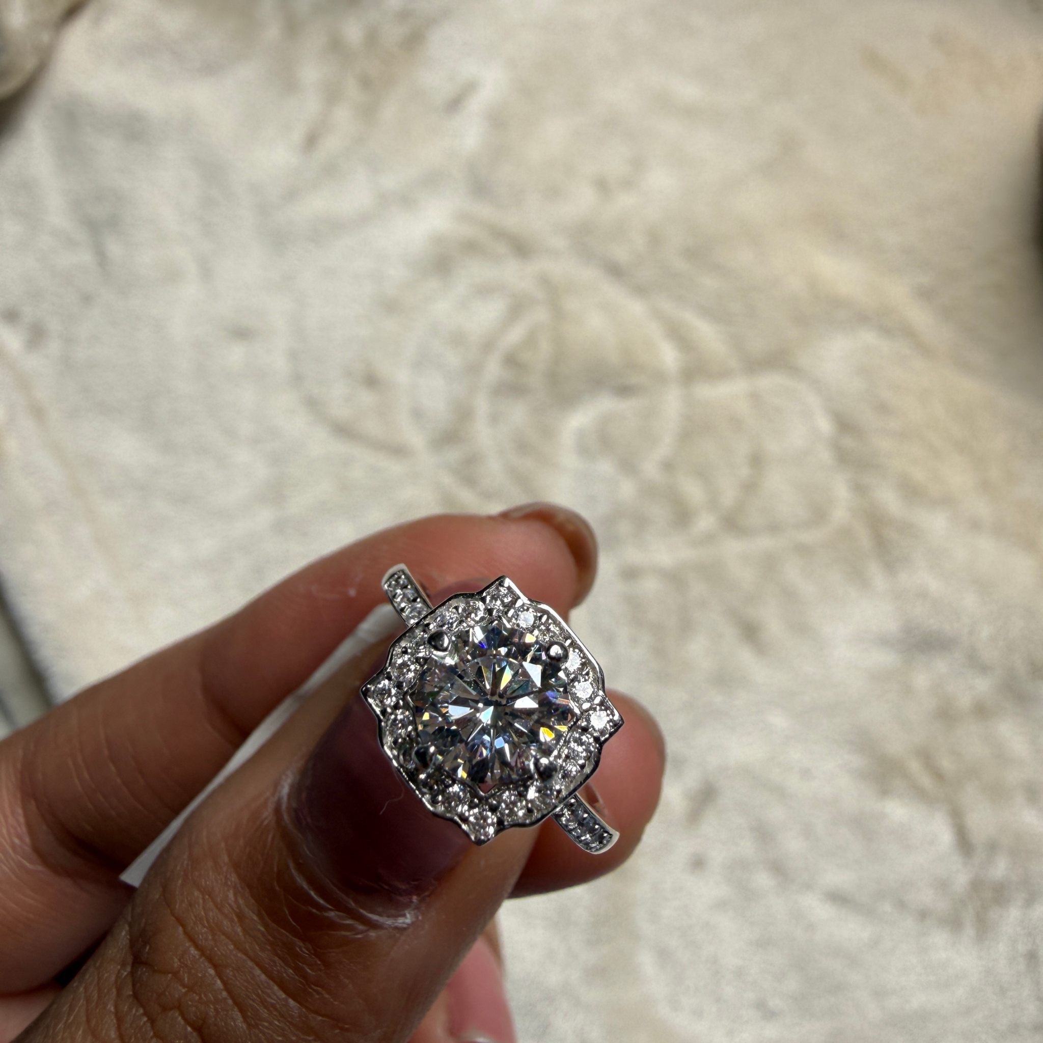 Vintage round lab-grown diamond halo ring in white gold by Kiashaa Jewellery.