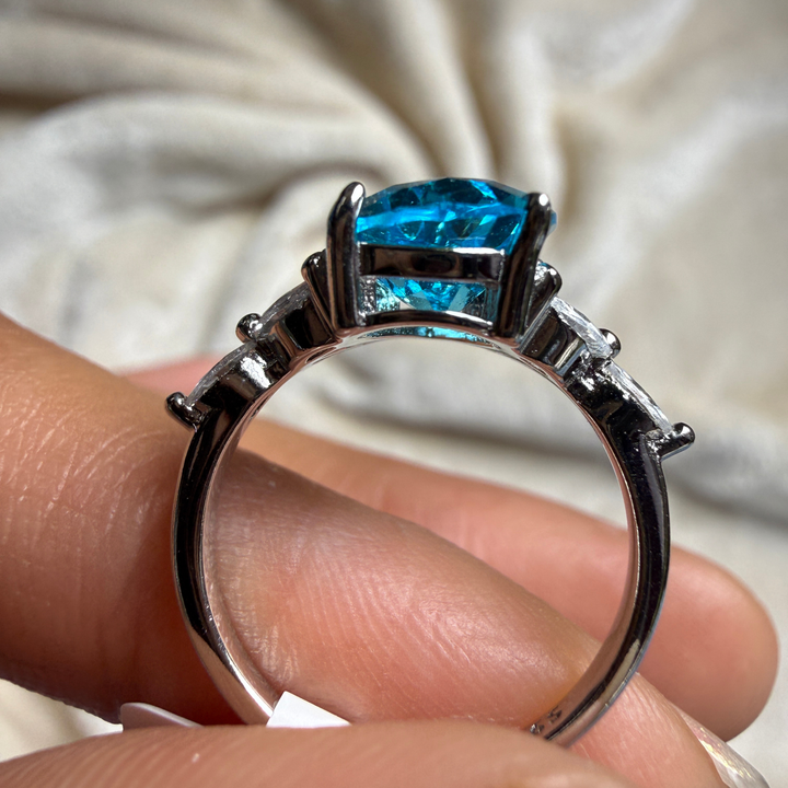 Blue pear gemstone and marquise lab-grown diamond ring by Kiashaa Jewellery.