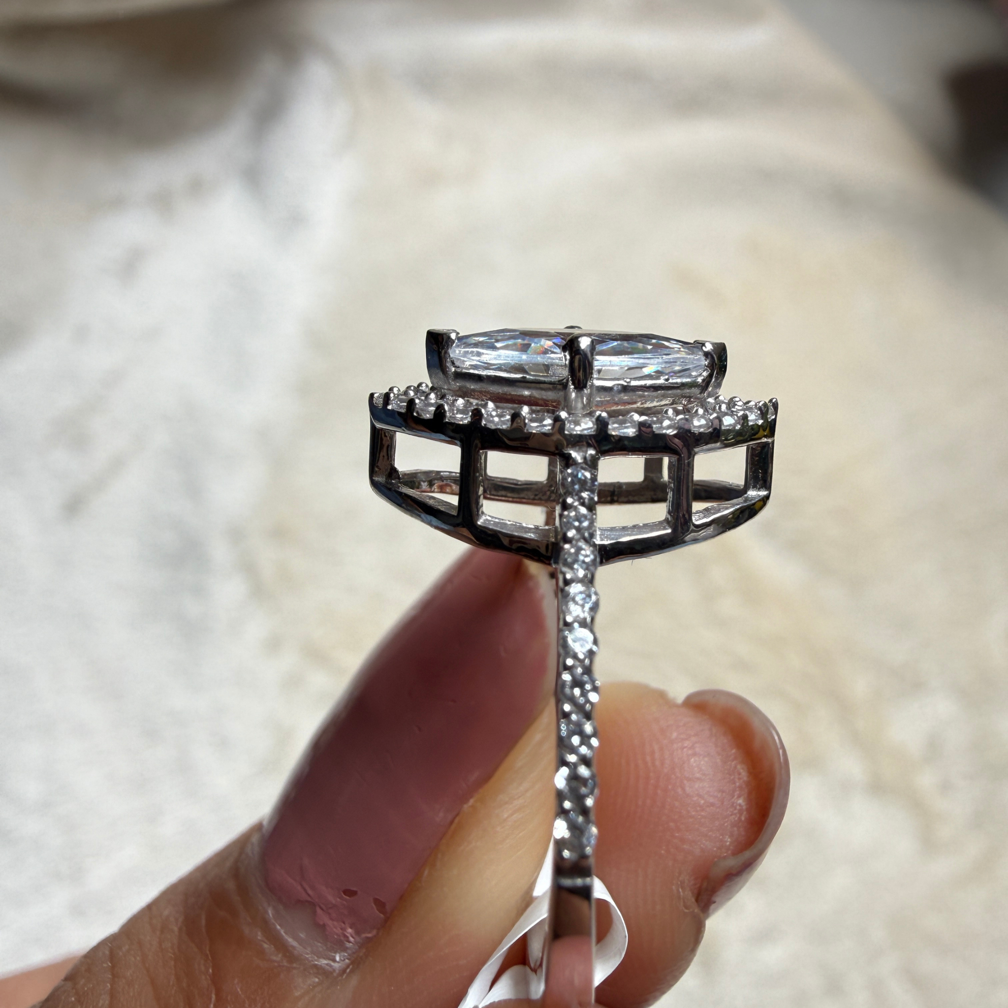 Marquise halo lab-grown diamond engagement ring in white gold by Kiashaa Jewellery.
