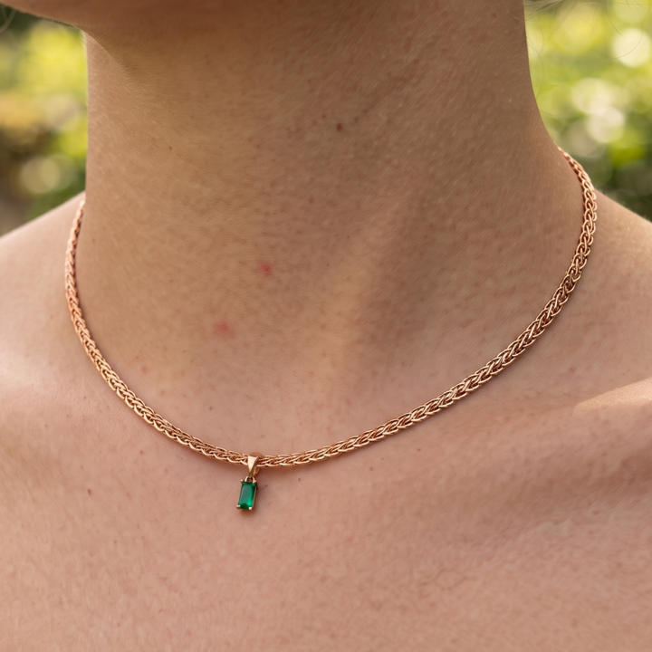 1.98 CT green emerald-cut pendant necklace in polished yellow gold.