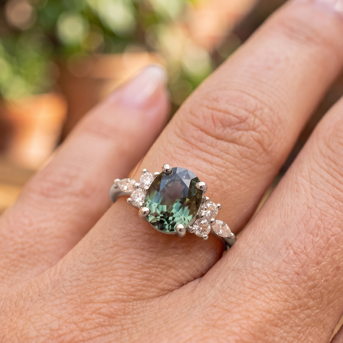 Kiashaa Jewellery 2.664 CTW green oval diamond ring in polished yellow gold.