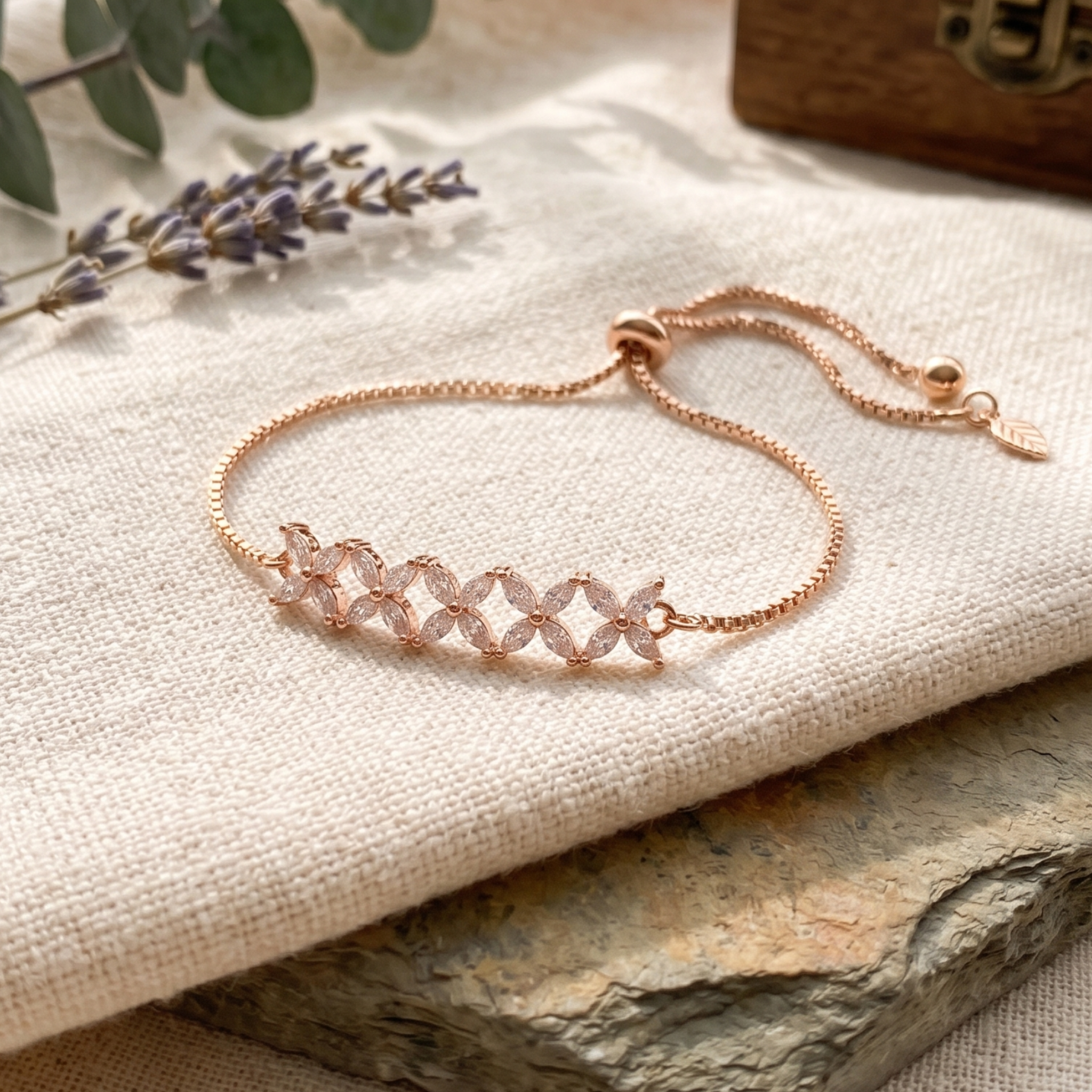 1.50 CT marquise diamond floral bracelet by Kiashaa Jewellery worn on a woman’s wrist in rose gold.