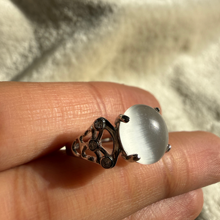 White cat's eye gemstone and lab-grown diamond ring by Kiashaa Jewellery.