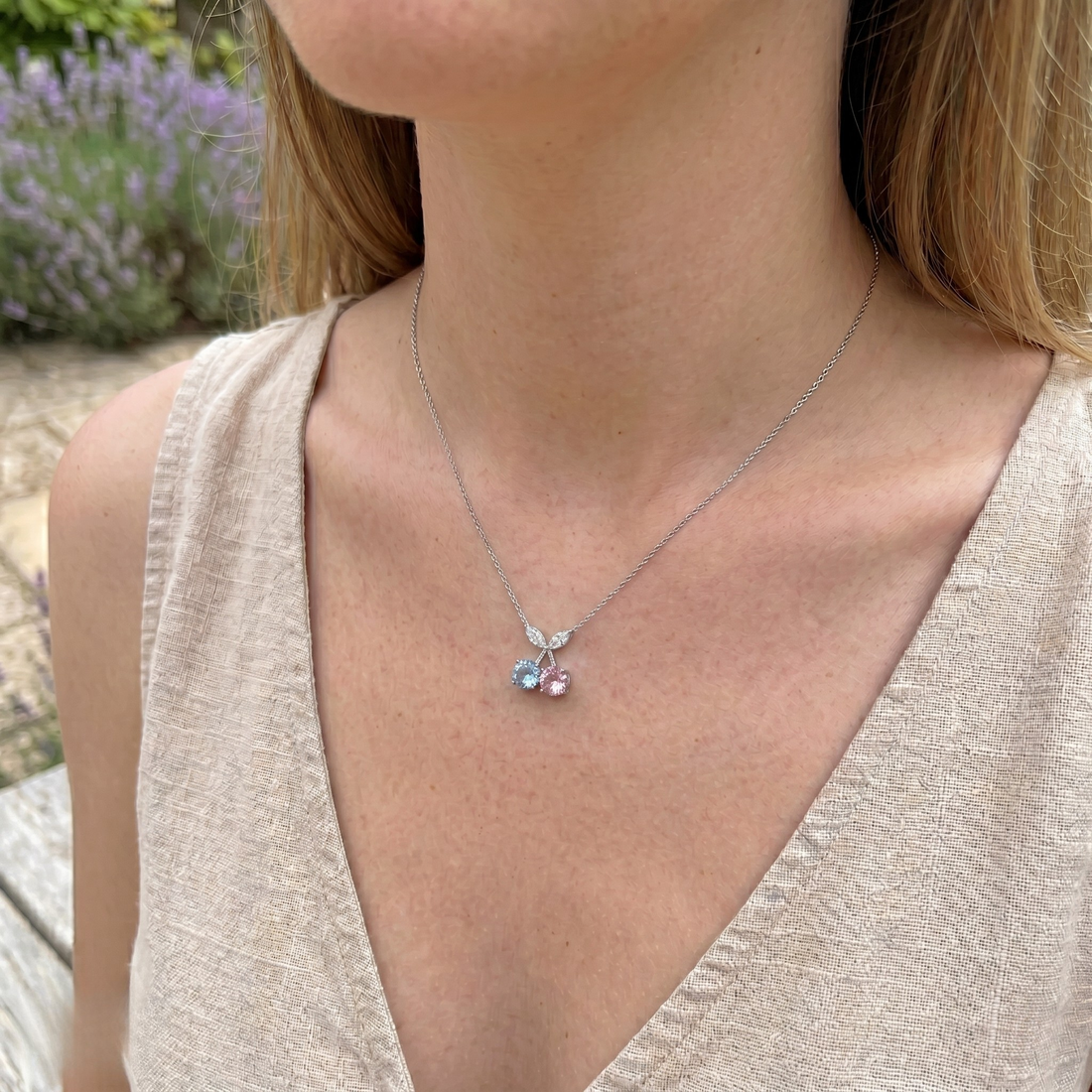 Blue and pink gemstone cherry pendant necklace with marquise lab-grown diamonds by Kiashaa Jewellery.
