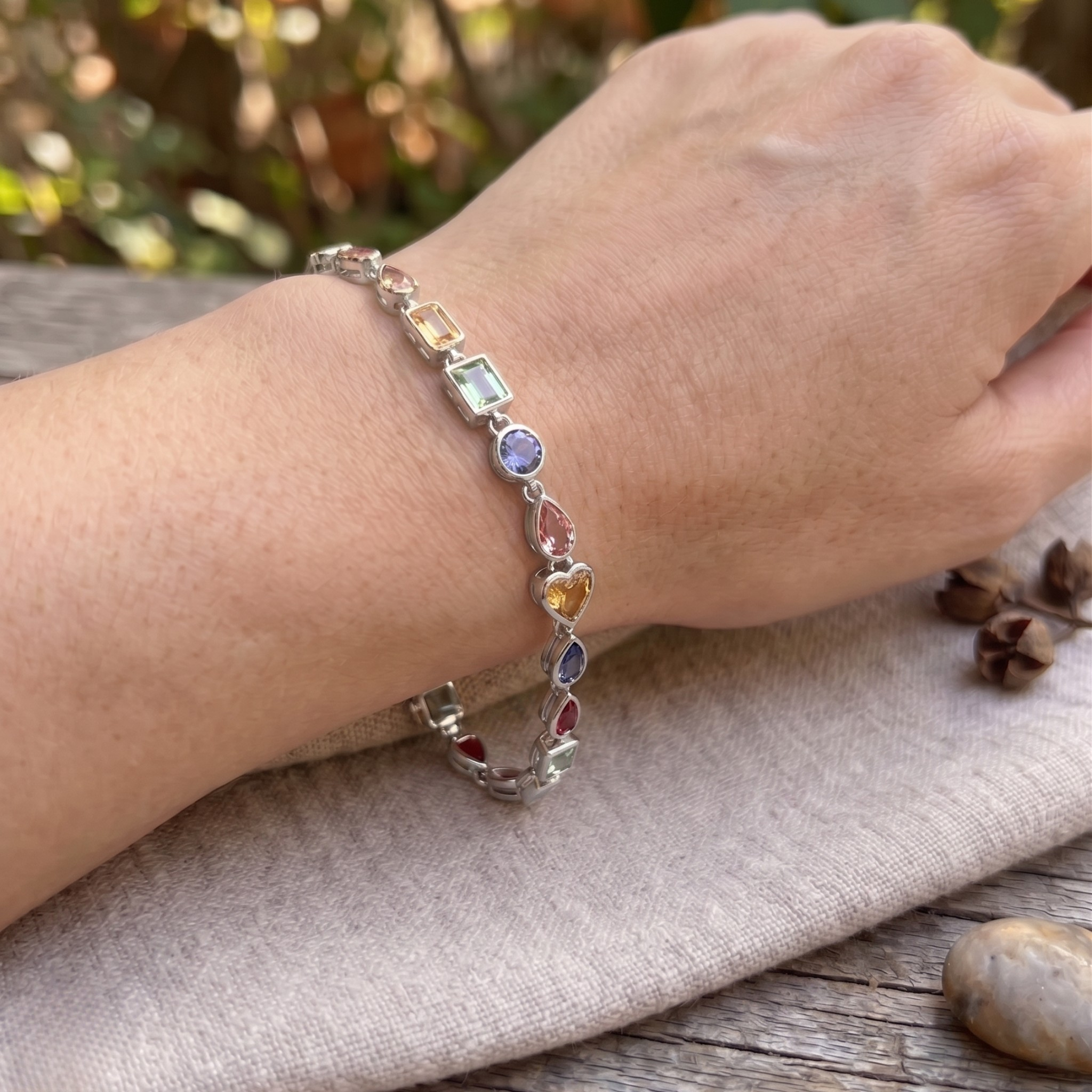 Colorful gemstone bracelet available in white, yellow and rose gold.