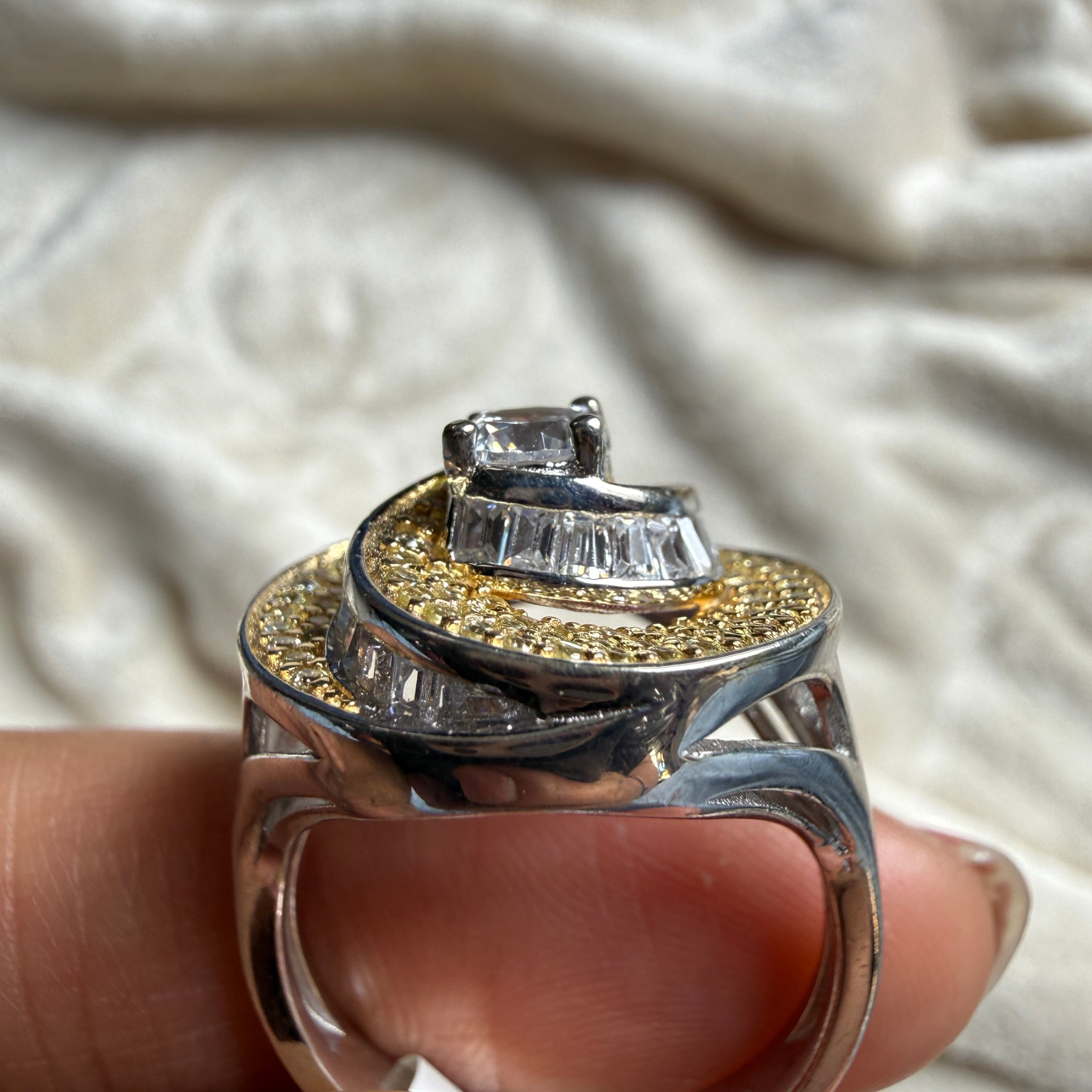 Round and baguette lab-grown diamond swirl statement ring by Kiashaa Jewellery.