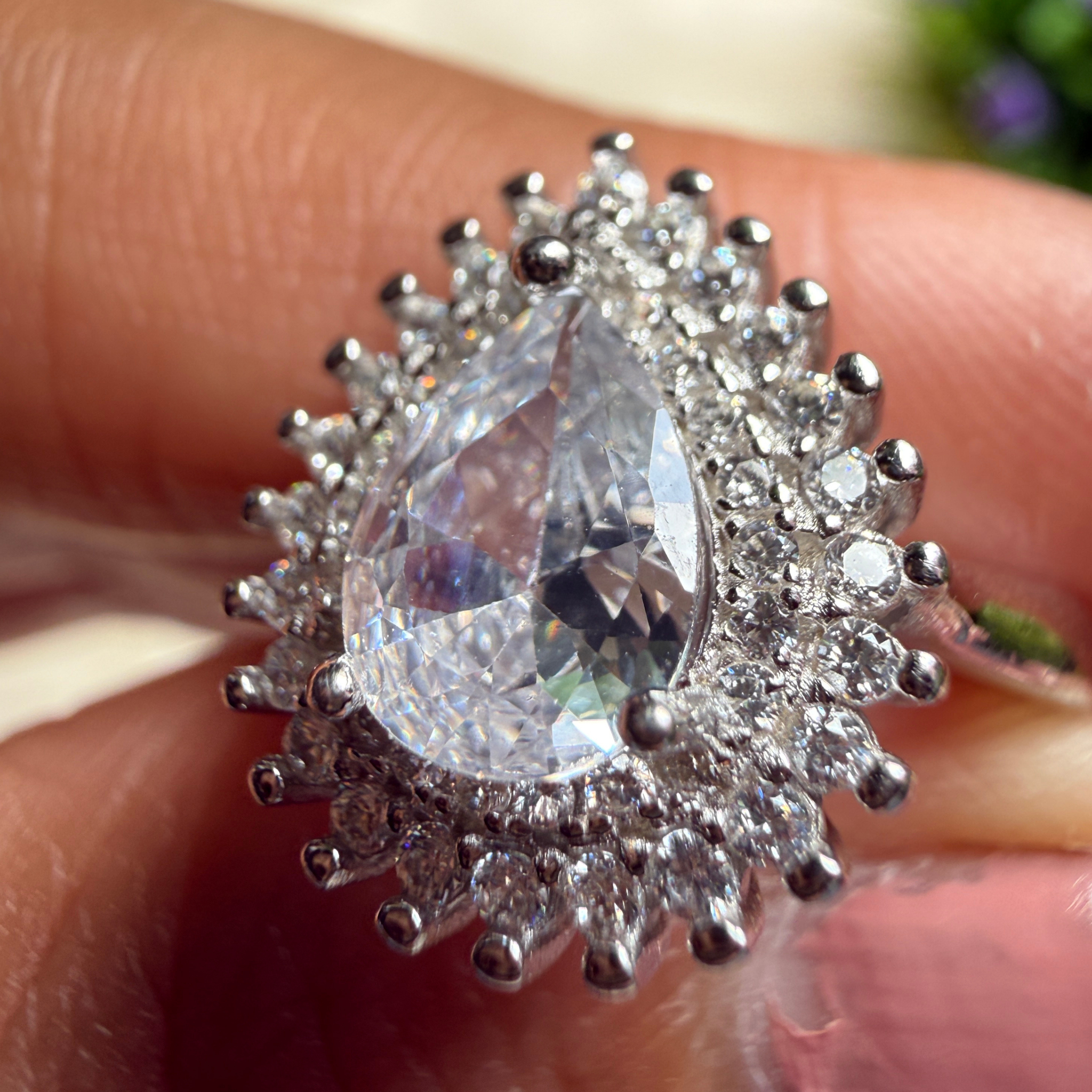 Pear halo lab-grown diamond engagement ring in white gold by Kiashaa Jewellery.