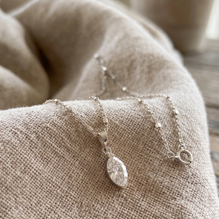 Eternal Marquise 0.66 CT solitaire pendant necklace by Kiashaa Jewellery featuring a 9 × 4.5 mm marquise center stone.