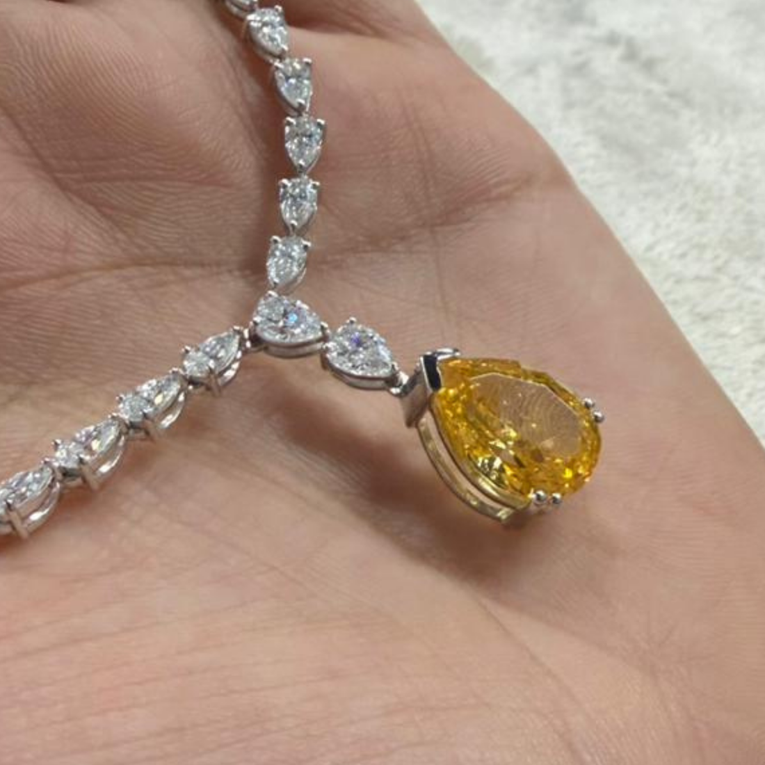 Royal Pear Cascade 27.59 CTW Diamond Tennis Necklace with Yellow Pear Drop in 9K, 14K & 18K Gold