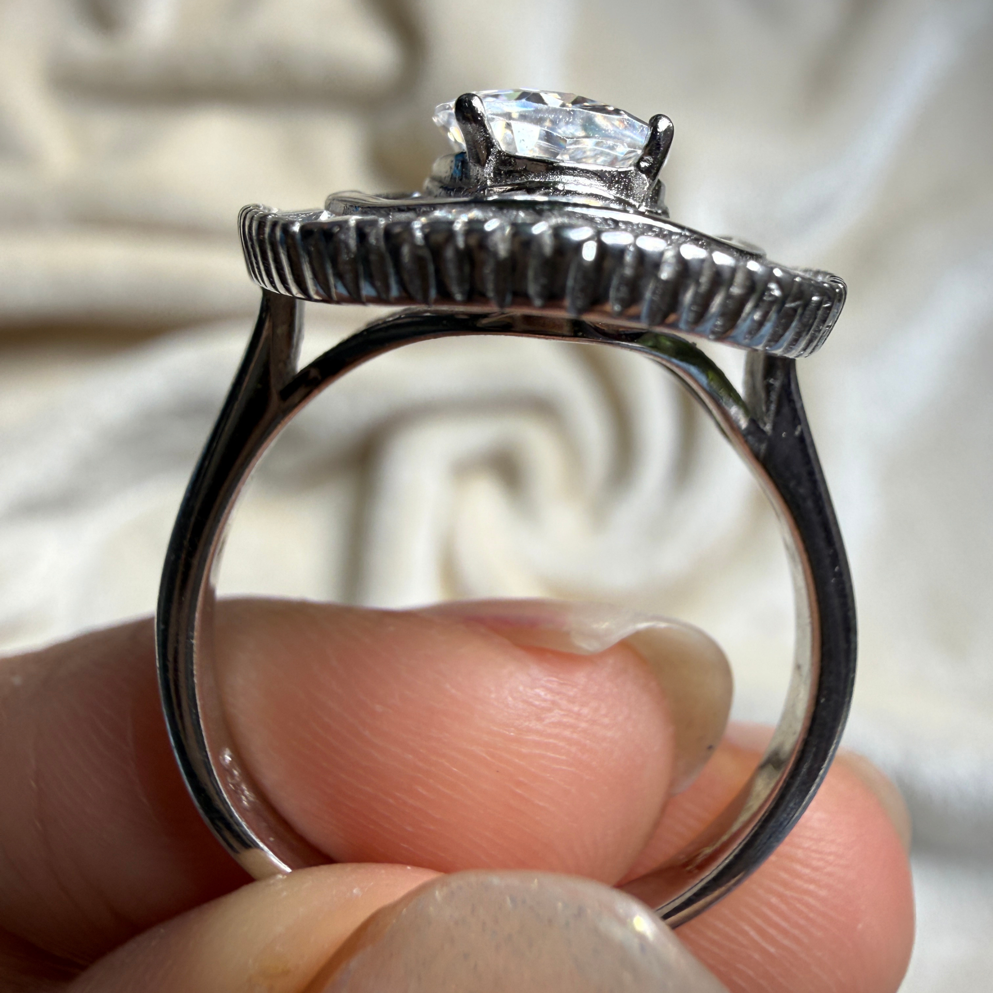 Oval and baguette lab-grown diamond double halo ring by Kiashaa Jewellery.