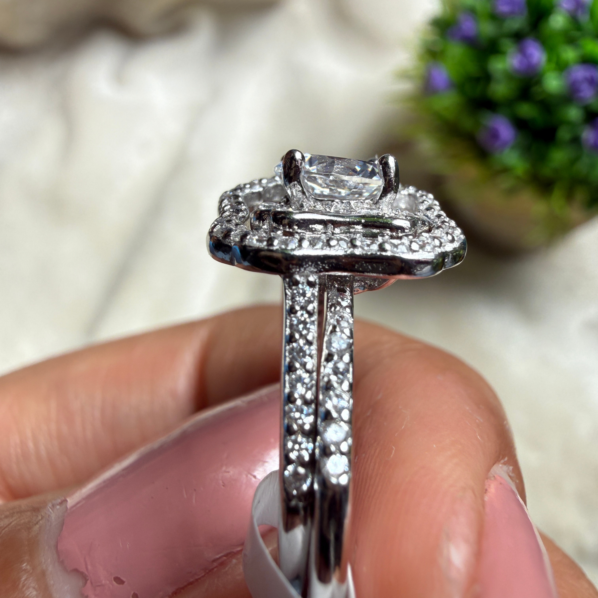 Round halo lab-grown diamond engagement ring in white gold by Kiashaa Jewellery.