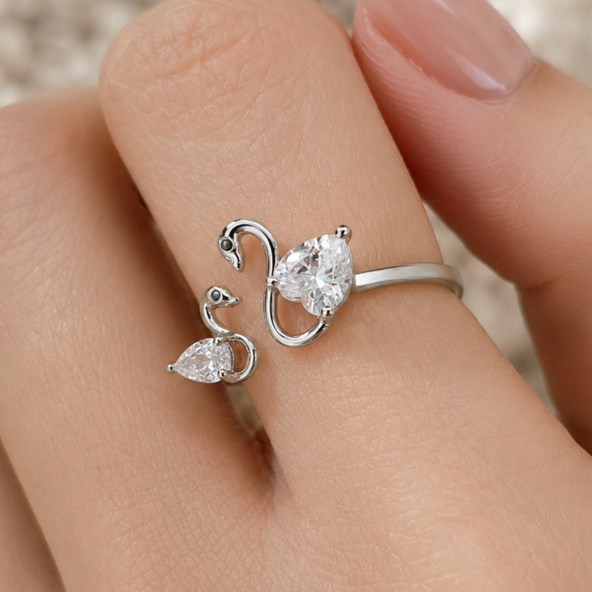 Swan Embrace 2.50 CTW lab-grown diamond ring by Kiashaa Jewellery with a 2 CT heart center and 0.50 CT pear side diamond.