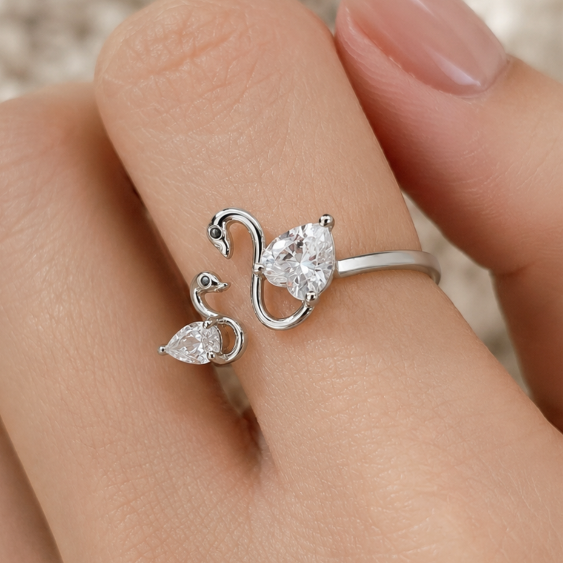 Swan Embrace 2.50 CTW lab-grown diamond ring by Kiashaa Jewellery with a 2 CT heart center and 0.50 CT pear side diamond.