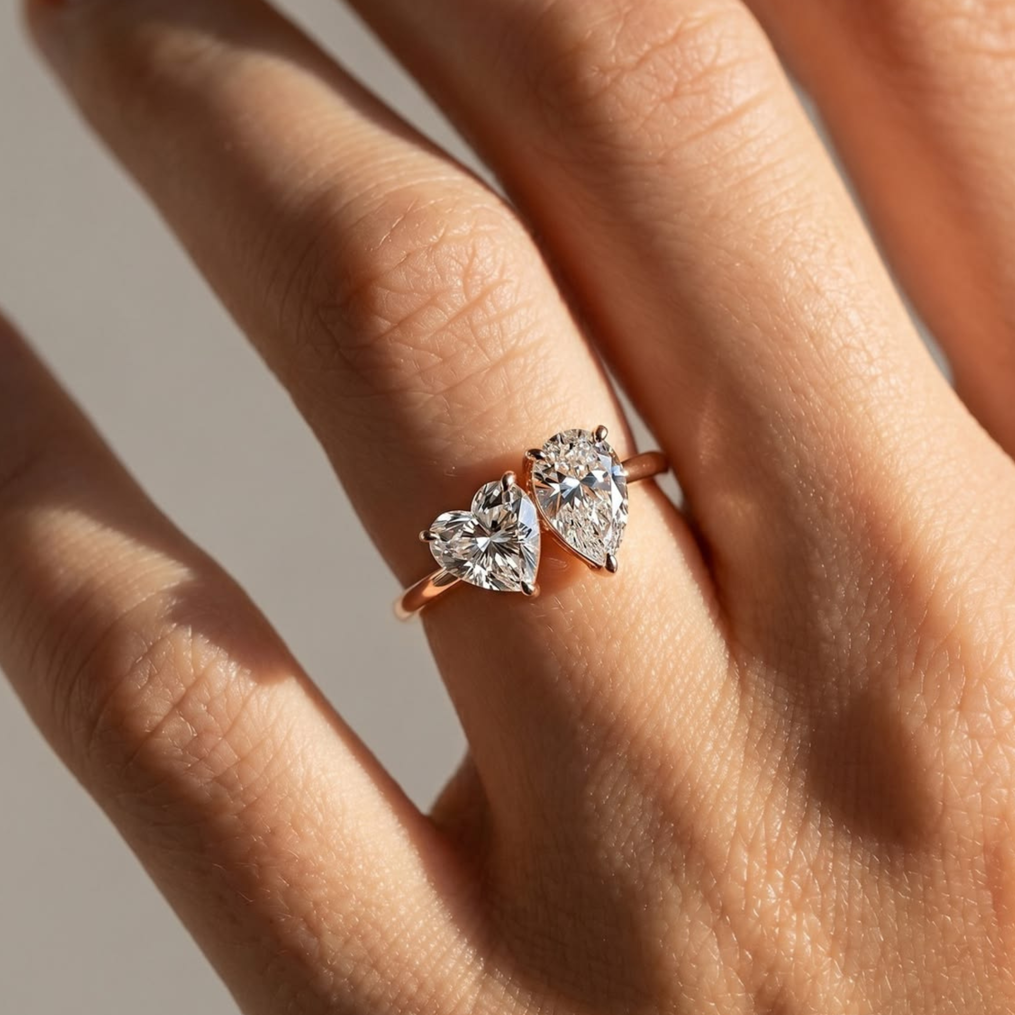6 × 6 mm heart diamond and 6 × 4 mm pear diamond two-stone ring