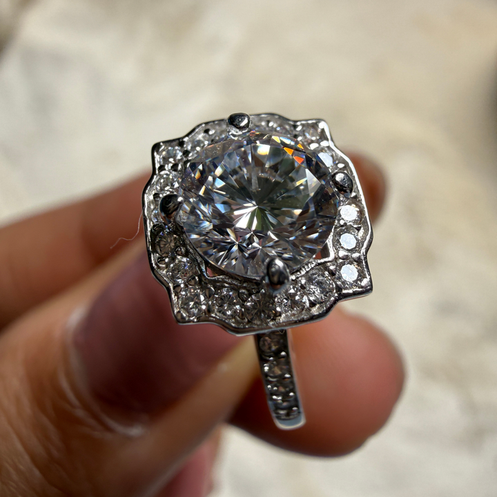 Vintage round lab-grown diamond halo ring in white gold by Kiashaa Jewellery.