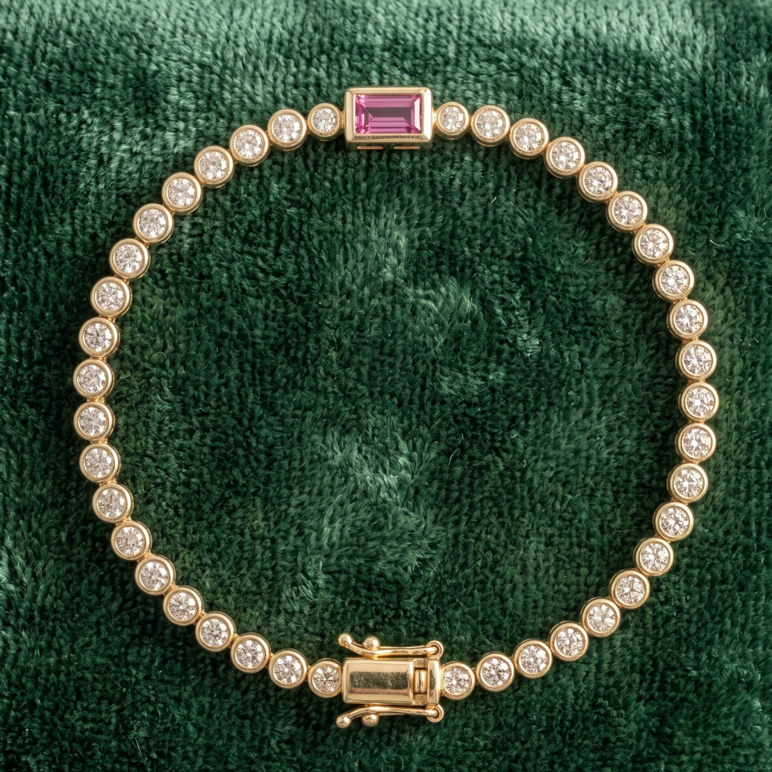 Kiashaa Jewellery 1.75 CTW diamond tennis bracelet with pink baguette center stone in yellow gold.
