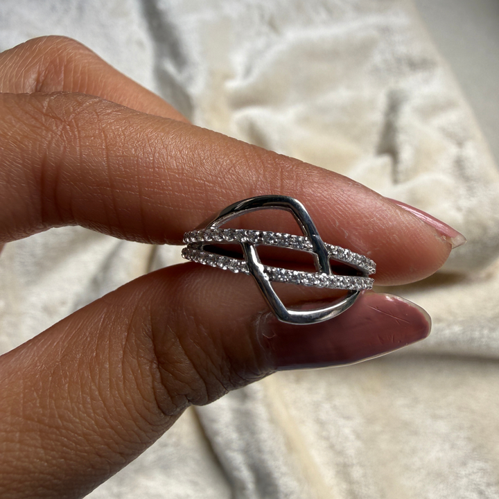 Contemporary open-frame diamond ring handcrafted in 9K, 14K and 18K gold.