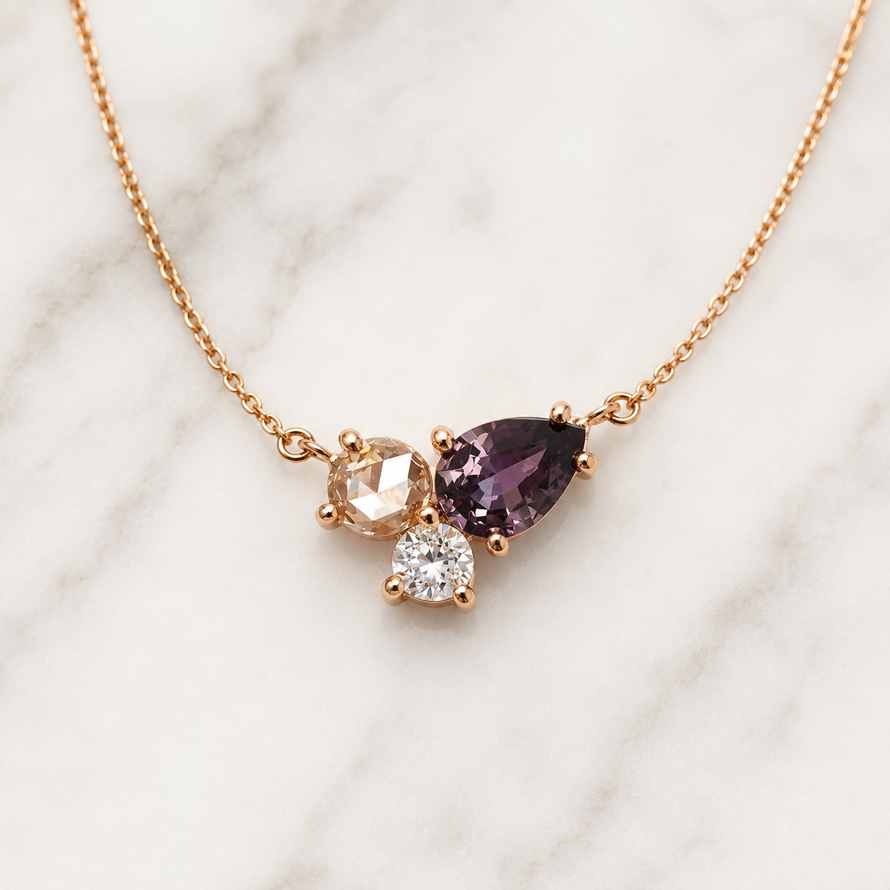 Kiashaa Jewellery white gold lab-grown diamond cluster pendant with multitone pear and round stones in a fine setting