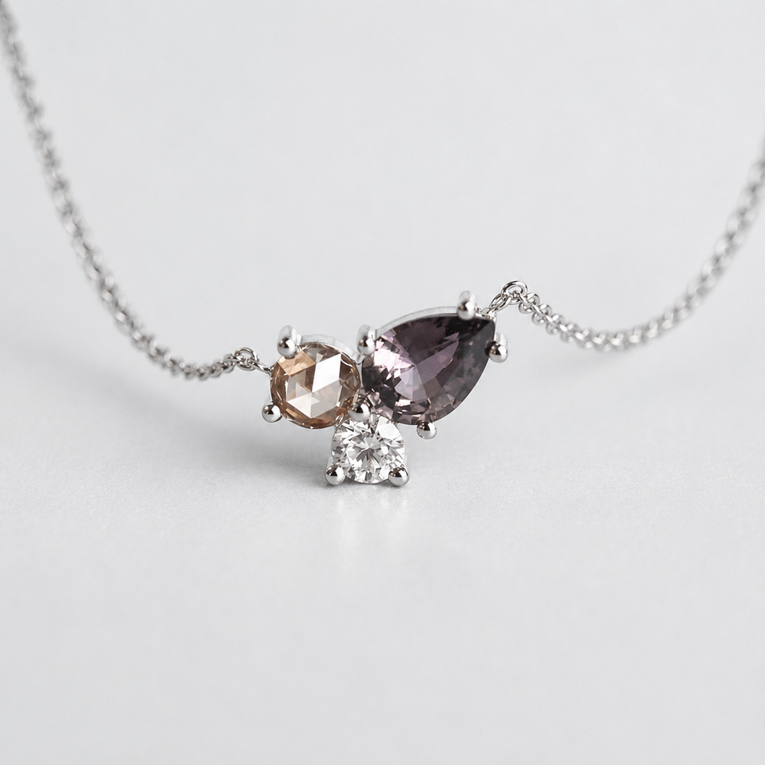 1.4 CT lab-grown diamond cluster pendant in white gold with pear and round stones by Kiashaa Jewellery