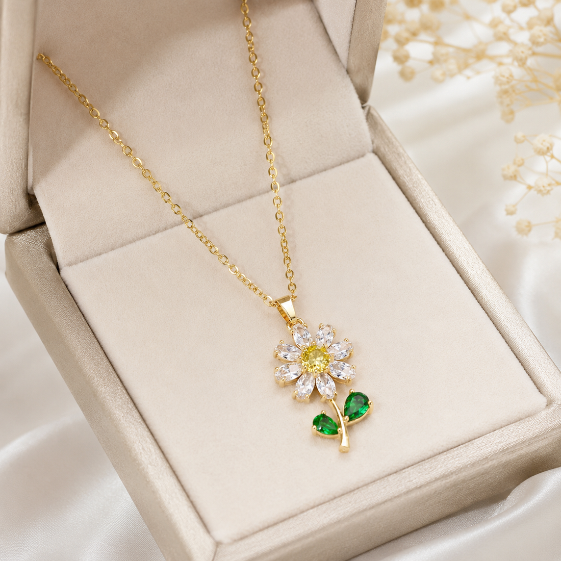 Floral lab-grown diamond flower pendant in polished yellow gold with vivid green leaves by Kiashaa Jewellery