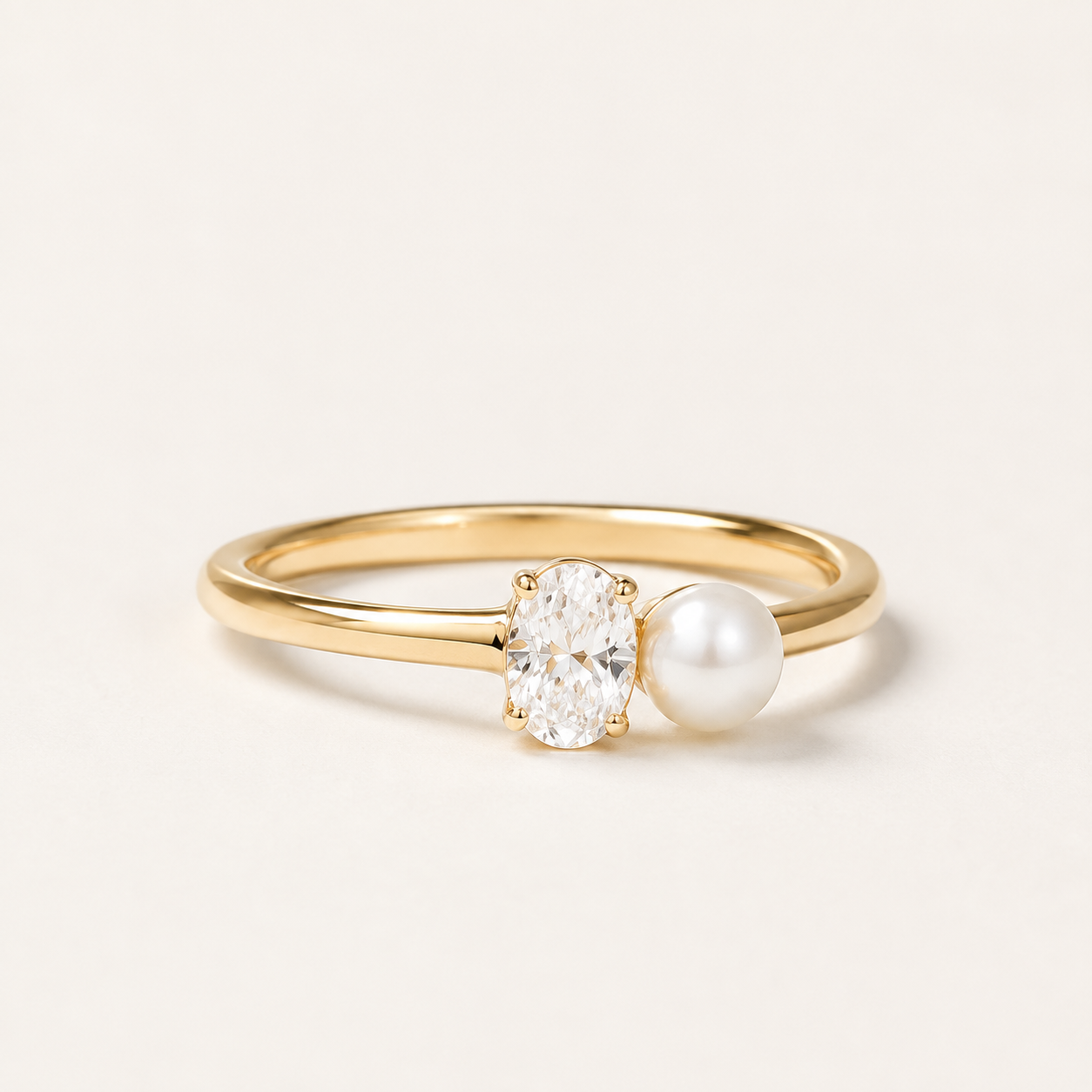 Elegant 0.5 CT oval lab-grown diamond and pearl ring in yellow gold by Kiashaa Jewellery for modern bridal style