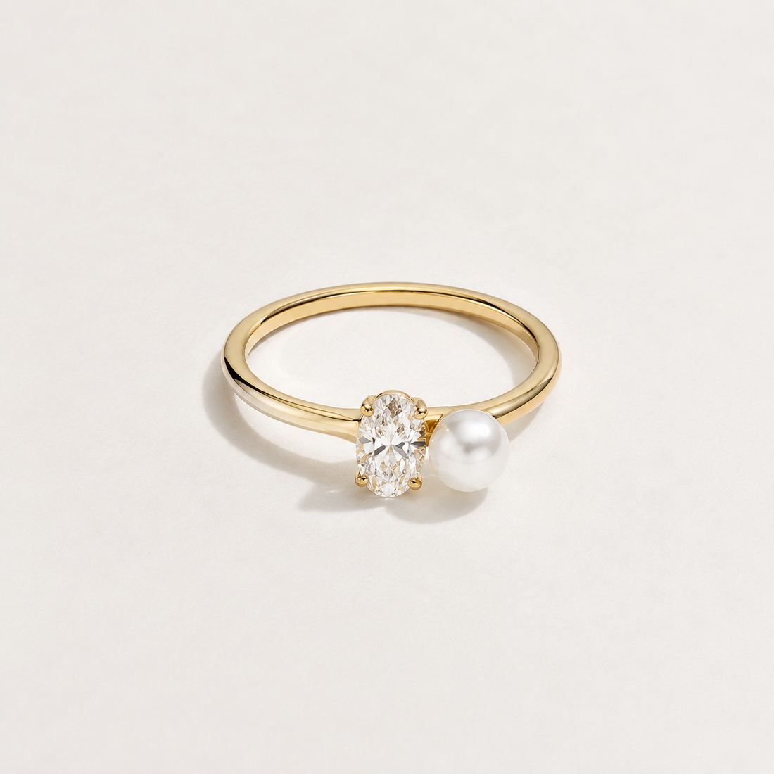 Kiashaa Jewellery oval lab-grown diamond and pearl ring in yellow gold, designed in a contemporary Toi et Moi style