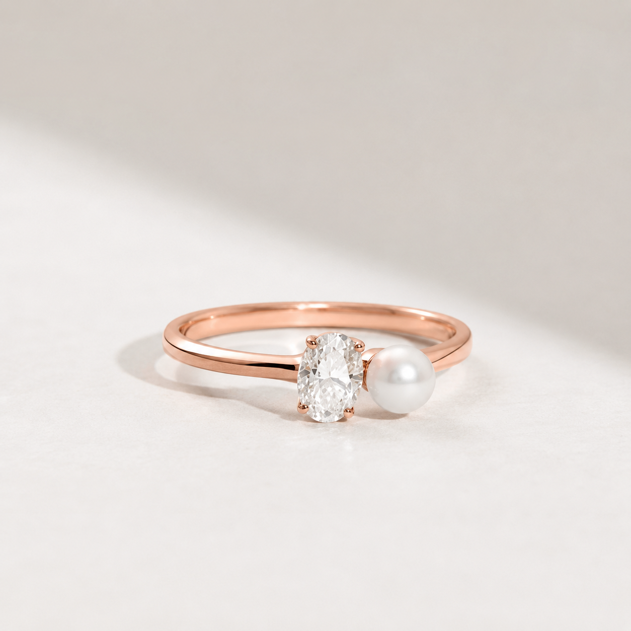 Yellow gold oval lab-grown diamond and pearl ring by Kiashaa Jewellery, featuring a delicate polished band