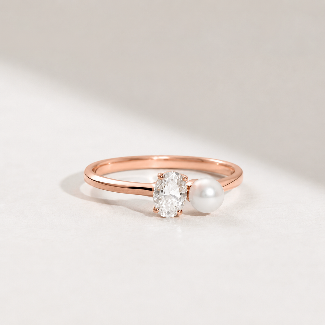 Yellow gold oval lab-grown diamond and pearl ring by Kiashaa Jewellery, featuring a delicate polished band