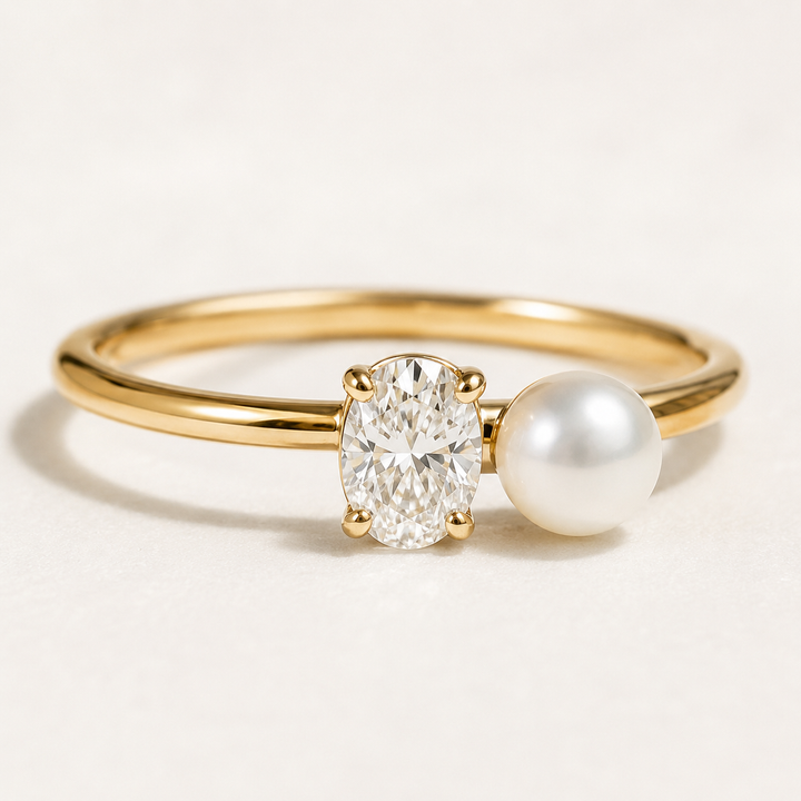 Kiashaa Jewellery oval lab-grown diamond and pearl ring in polished yellow gold, shown in a refined front view