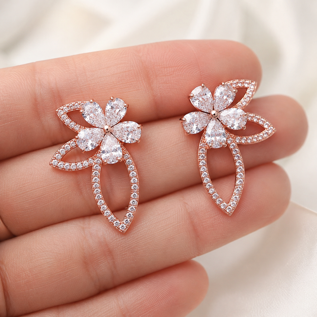 Luxury lab-grown diamond floral earrings in rose gold by Kiashaa Jewellery with open leaf motifs and brilliant sparkle