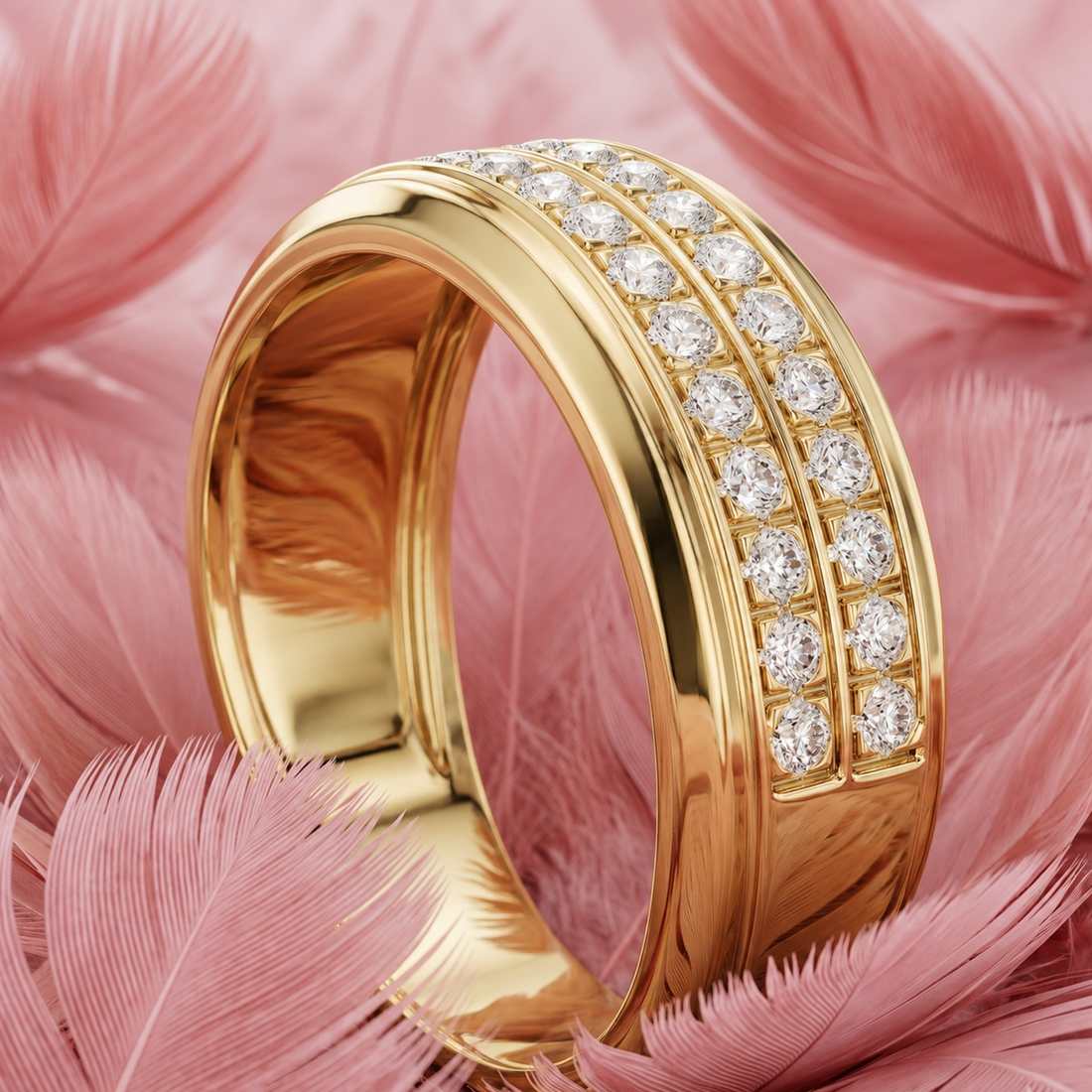 A polished yellow gold ring with three rows of sparkling clear pavé stones, displayed on a bed of soft pink feathers.