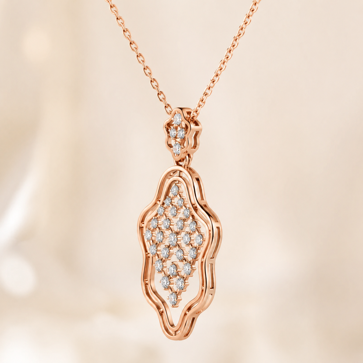 Rose gold pendant necklace with a pavé diamond design, shown on a delicate chain against a soft, warm beige background.