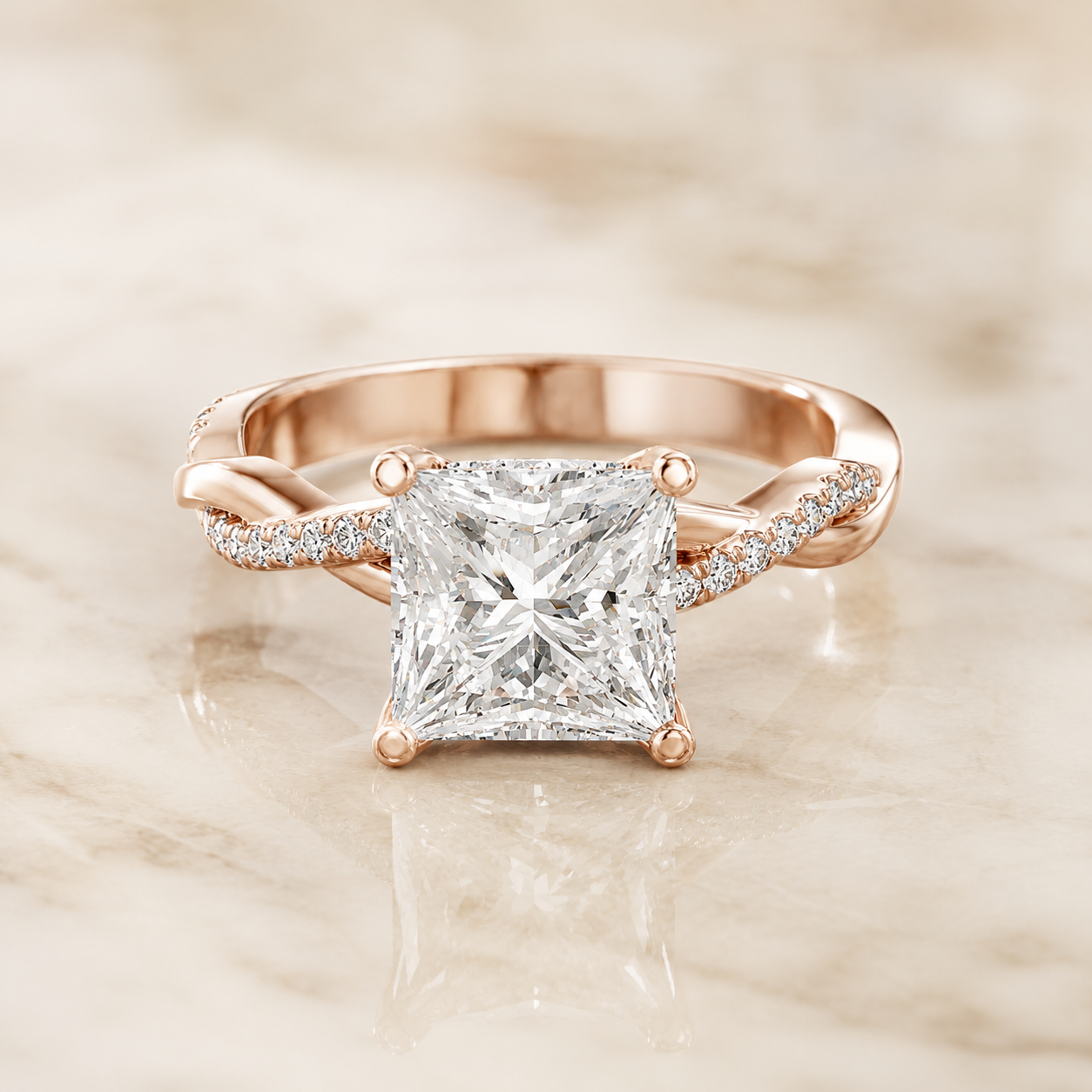 A rose gold engagement ring featuring a large princess-cut diamond center stone and pavé-set diamonds along a twisted shank, displayed on a light marble surface.
