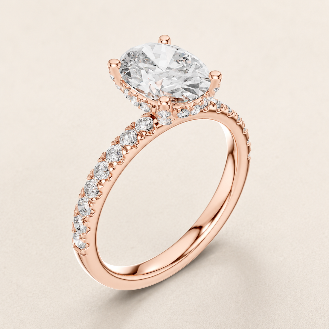 White gold oval diamond engagement ring by Kiashaa Jewellery featuring a 2 CT centre and hidden halo