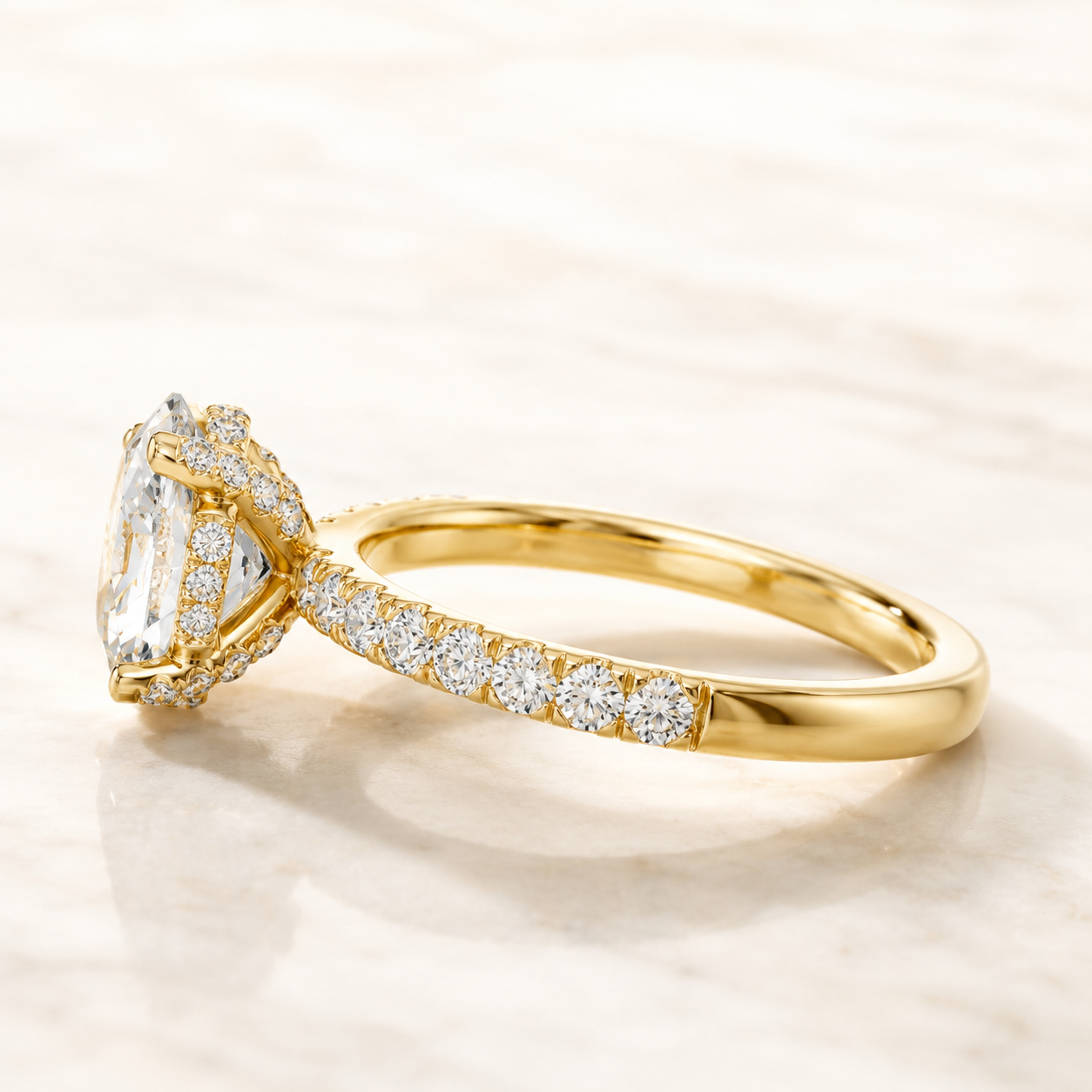 White gold oval diamond engagement ring by Kiashaa Jewellery featuring a 2 CT centre and hidden halo